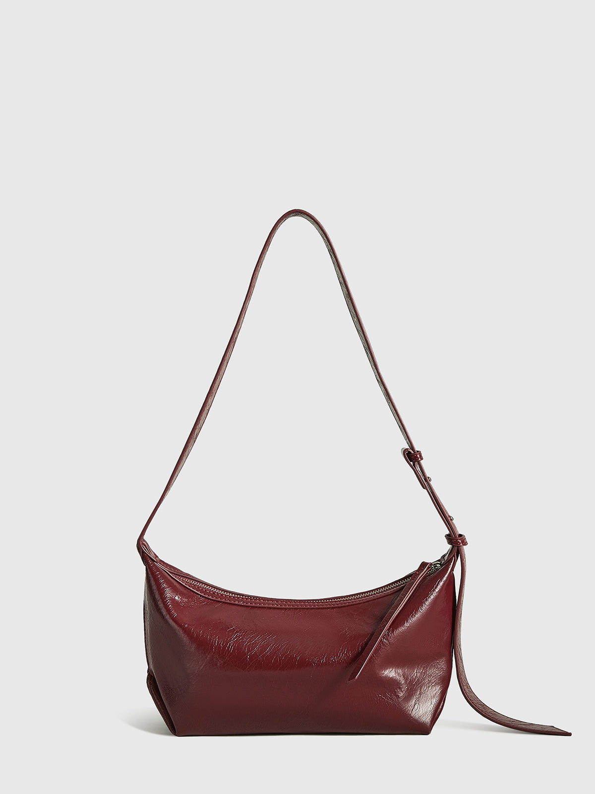 Sac avec fermeture éclair et sangle réglable