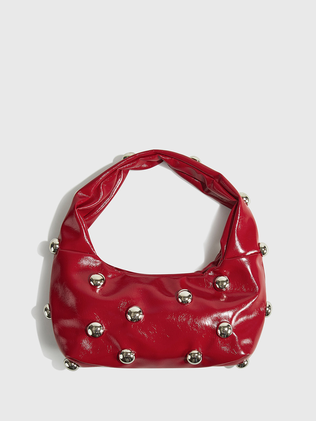Sac à main arrondi avec clous