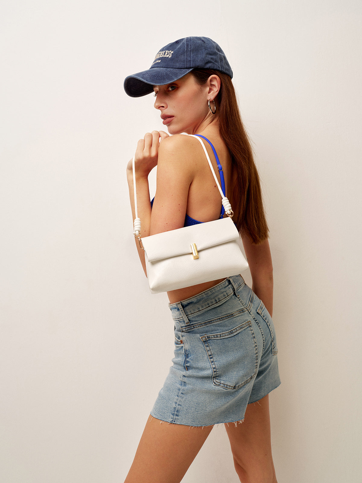 Sac à bandoulière pliable avec poignée nouée