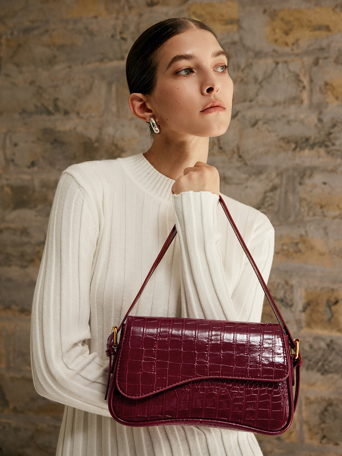 Petit sac à carreaux avec boucle pour bras
