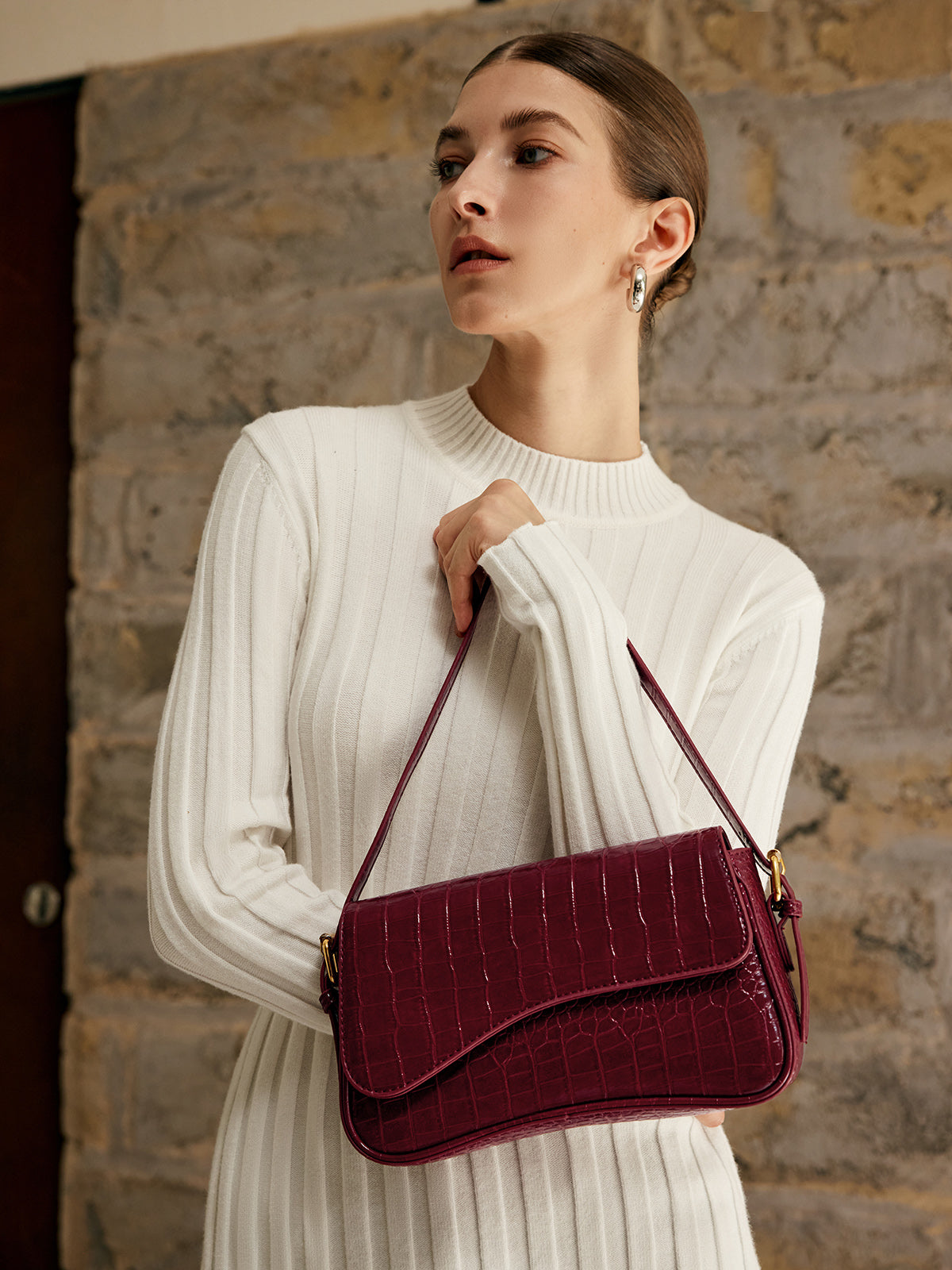 Petit sac à carreaux avec boucle pour bras