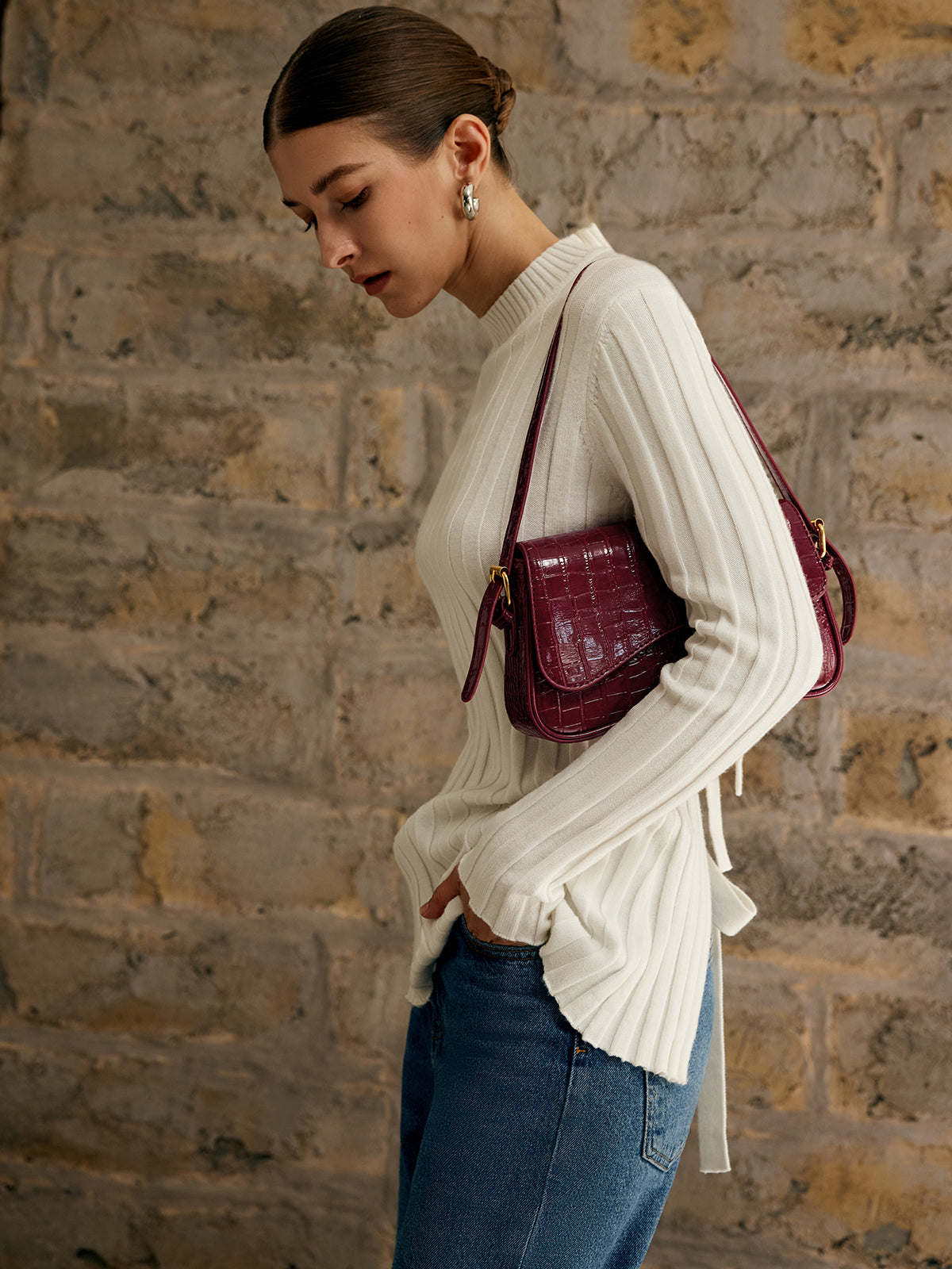Petit sac à carreaux avec boucle pour bras