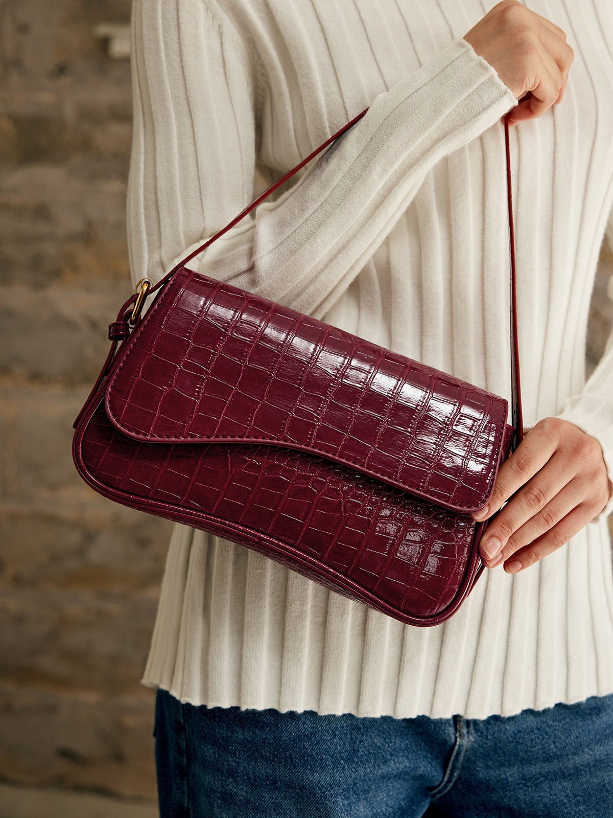 Petit sac à carreaux avec boucle pour bras