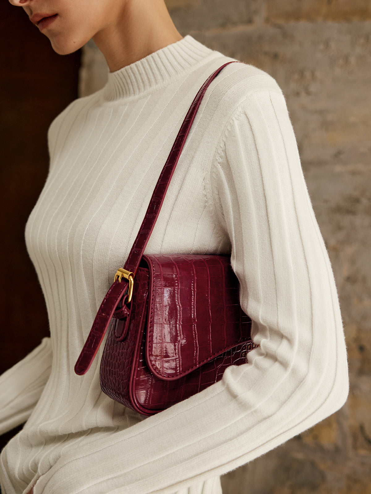 Petit sac à carreaux avec boucle pour bras