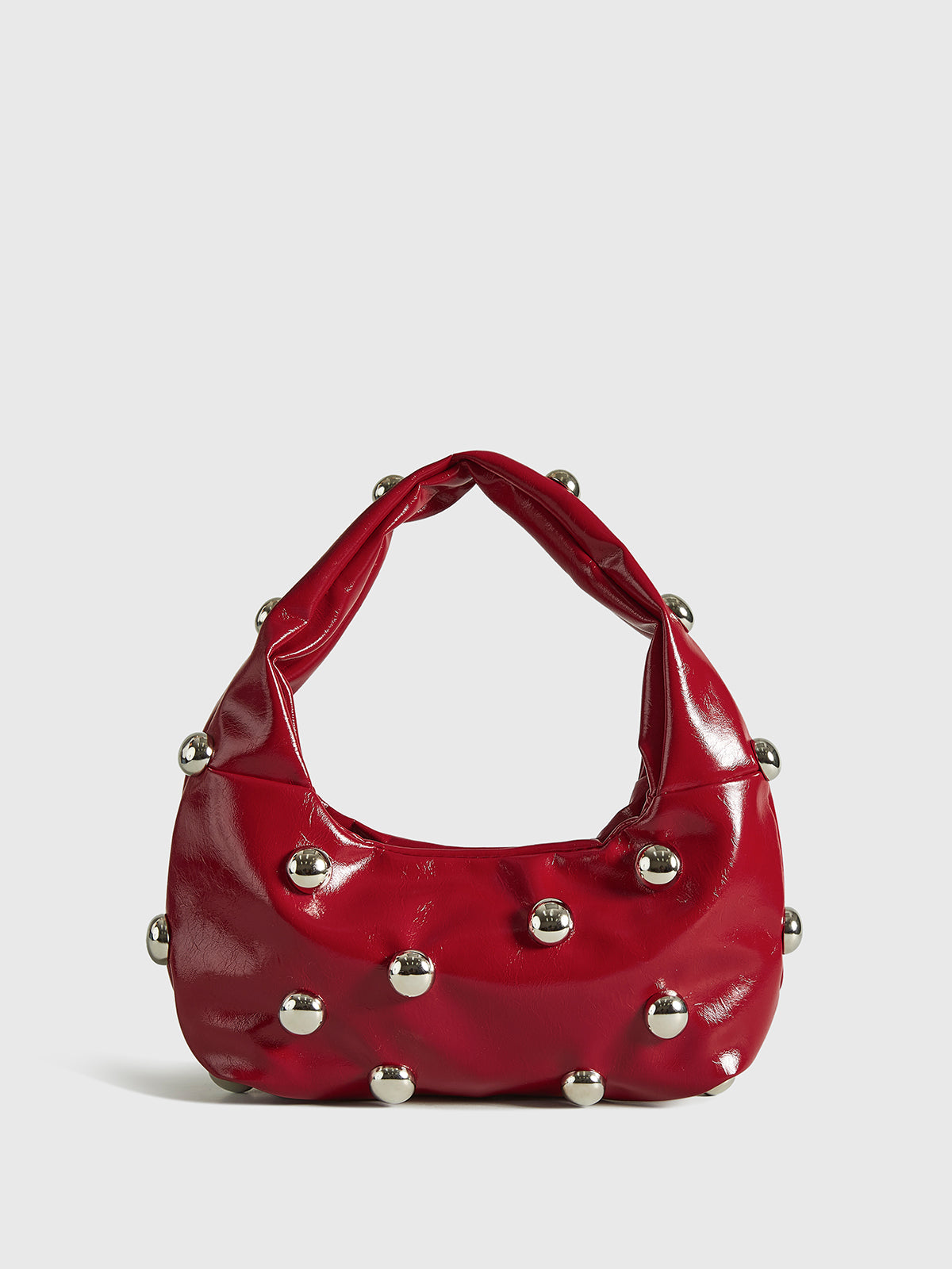 Sac à main arrondi avec clous