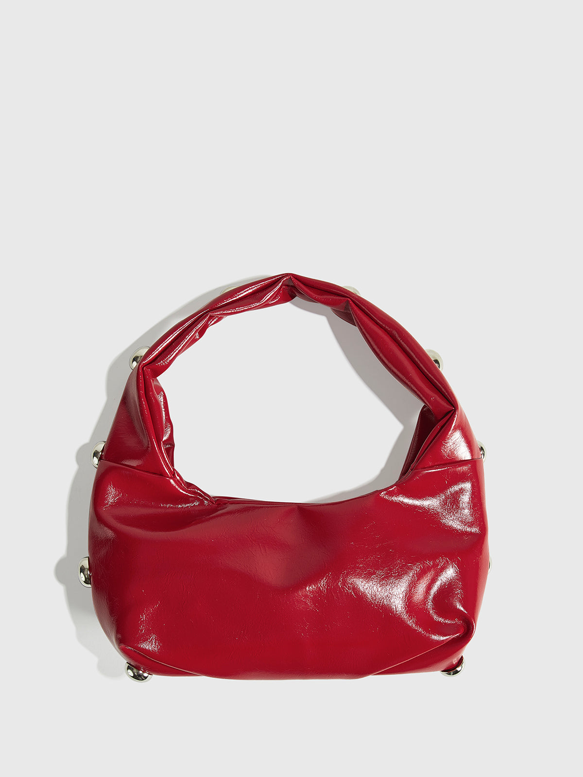 Sac à main arrondi avec clous