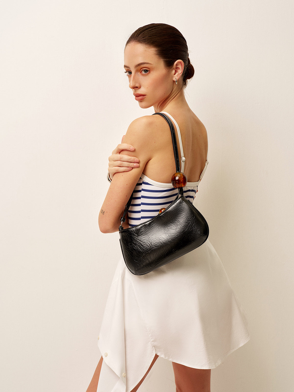 Sac à bandoulière en simili cuir avec perles