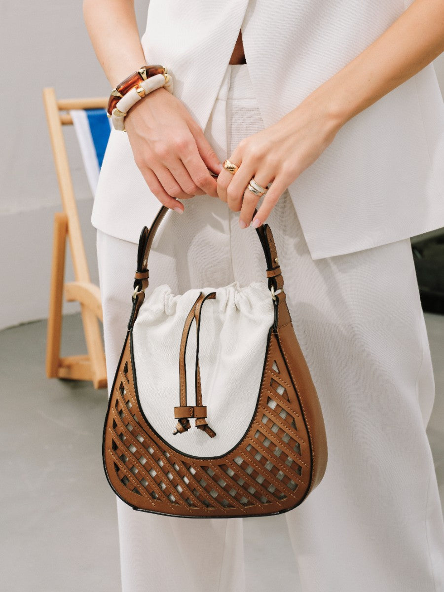Sac en cuir tissé avec cordon de fermeture